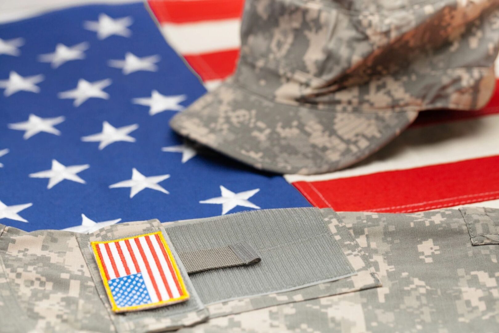 A close up of an american flag and some military items