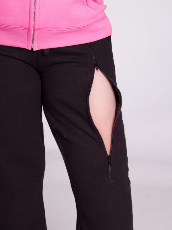 A close up of the side slit on a woman 's pants